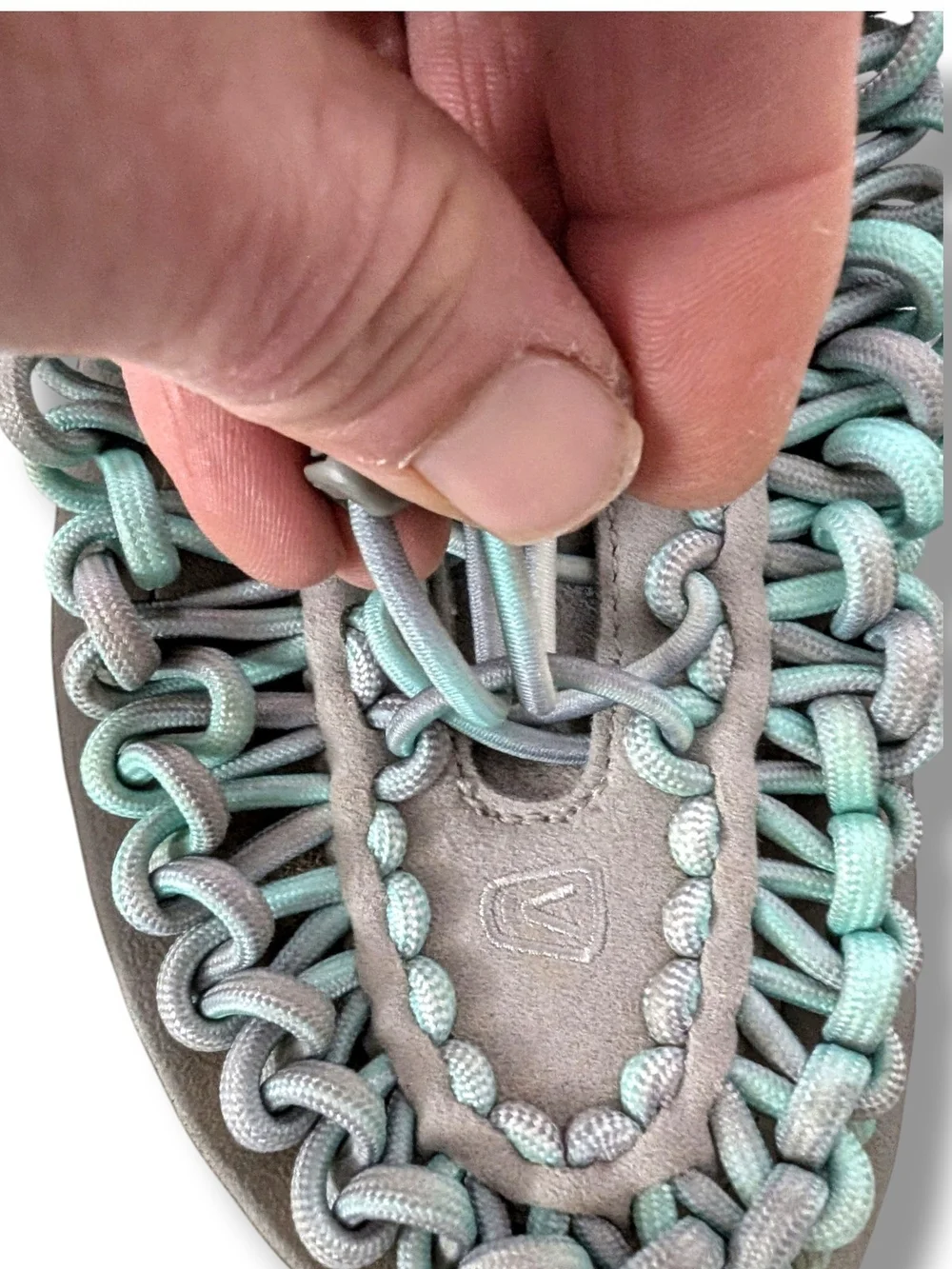 NWOT KEEN Women's Uneek open-air cord sandals in a grey and aqua blue colorway